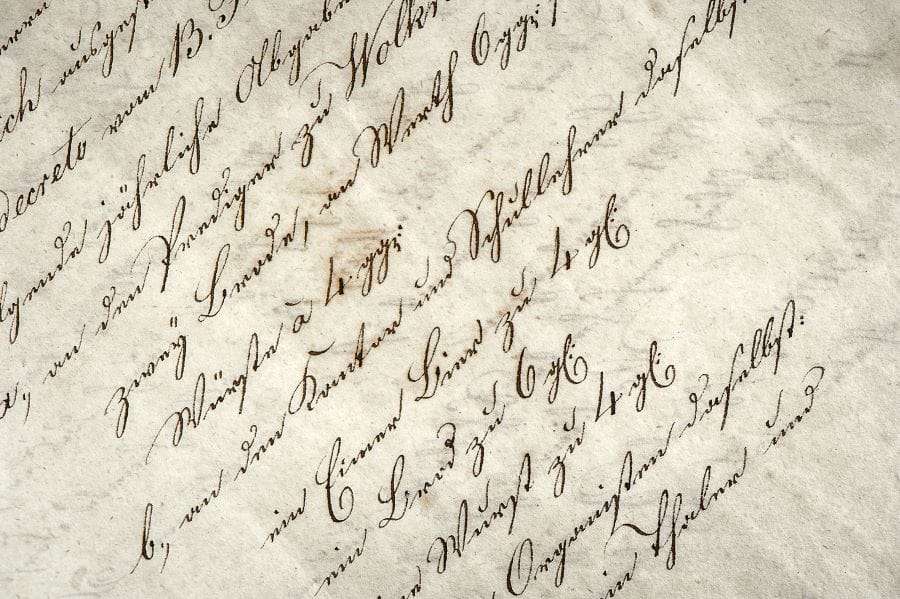 Beautiful black calligraphy script on white paper